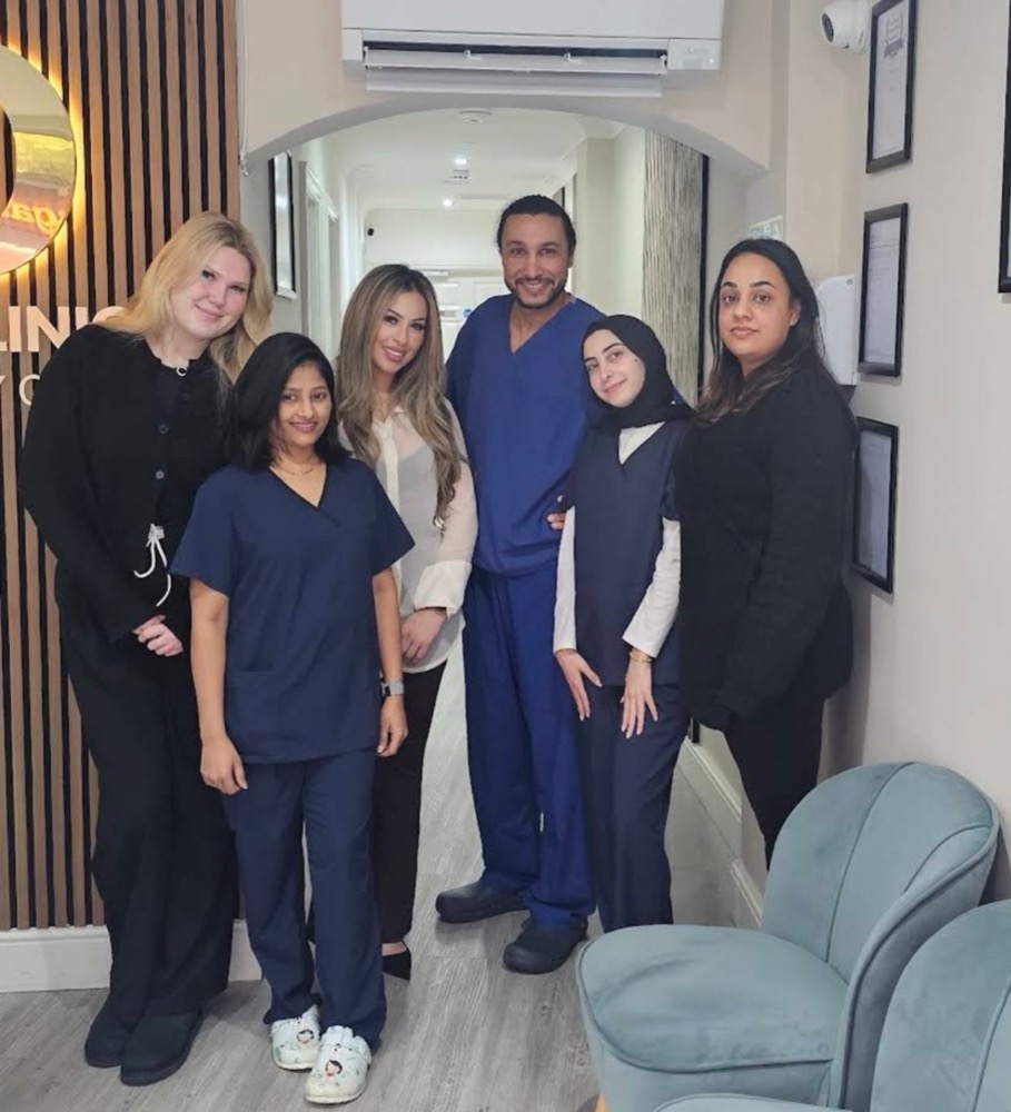 Hanan with the surgeon and clinical team at the clinic
